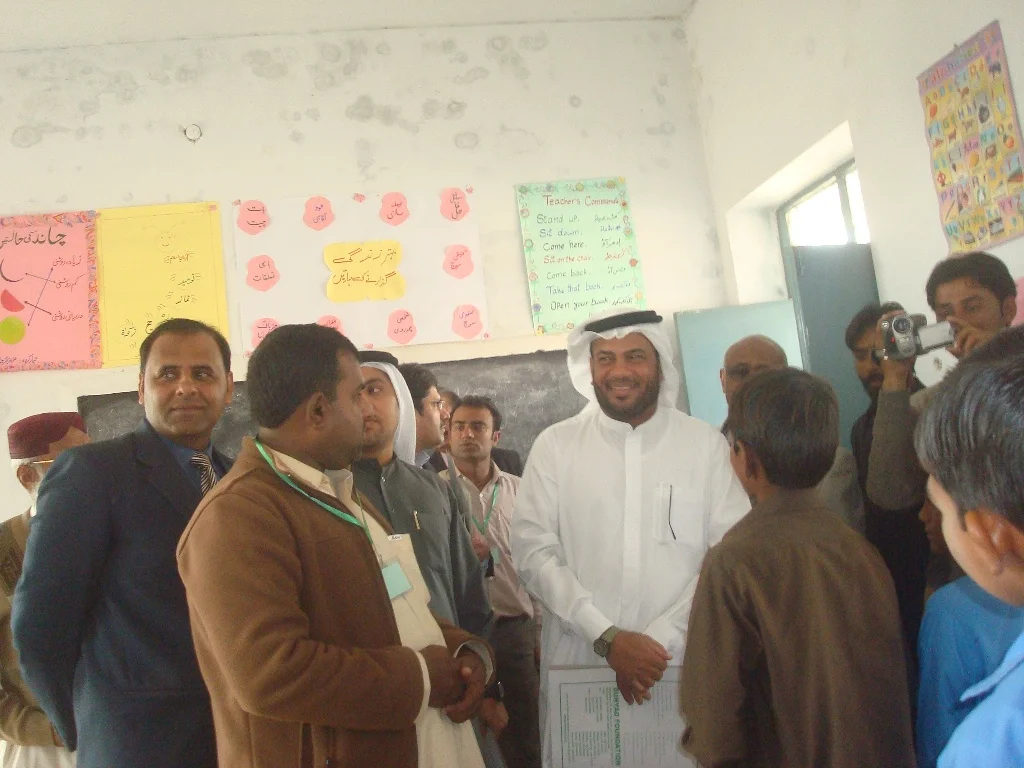 UAE Government official meeting former camel jockey children in a Bunyad classroom